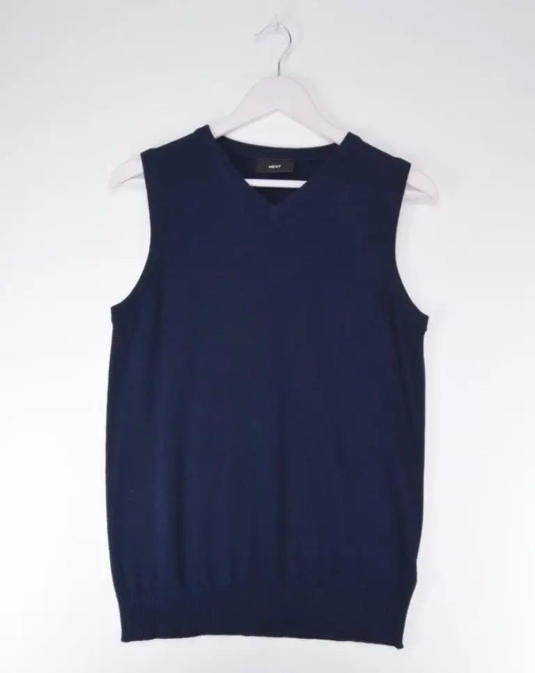 Front view of School Uniform Sleeveless Jumper - Classic vintage fashion for rent from Circular Costume Ireland